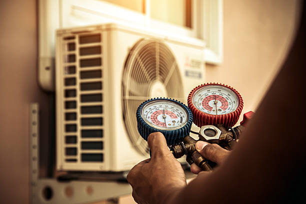 Professional Heat Pump Repair technician working in Watertown, MA